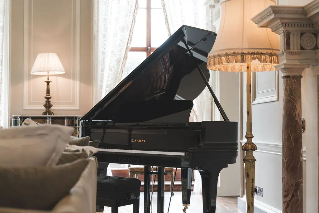 The grand piano in the piano room
